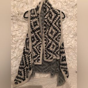Beautiful soft fuzzy shawl vest. One size